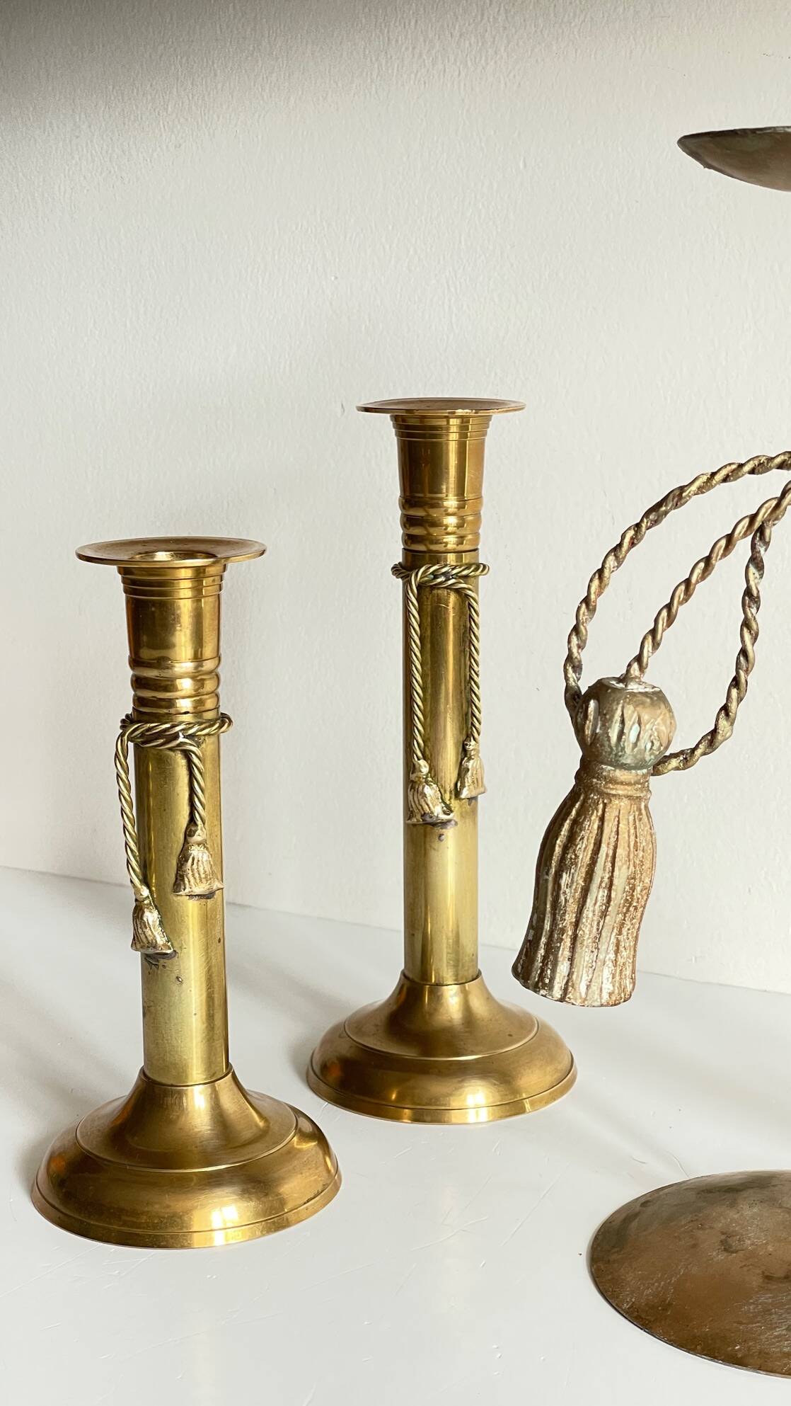 Trio of vintage knotted candlesticks brass