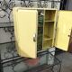 Antique iron pharmacy cabinet