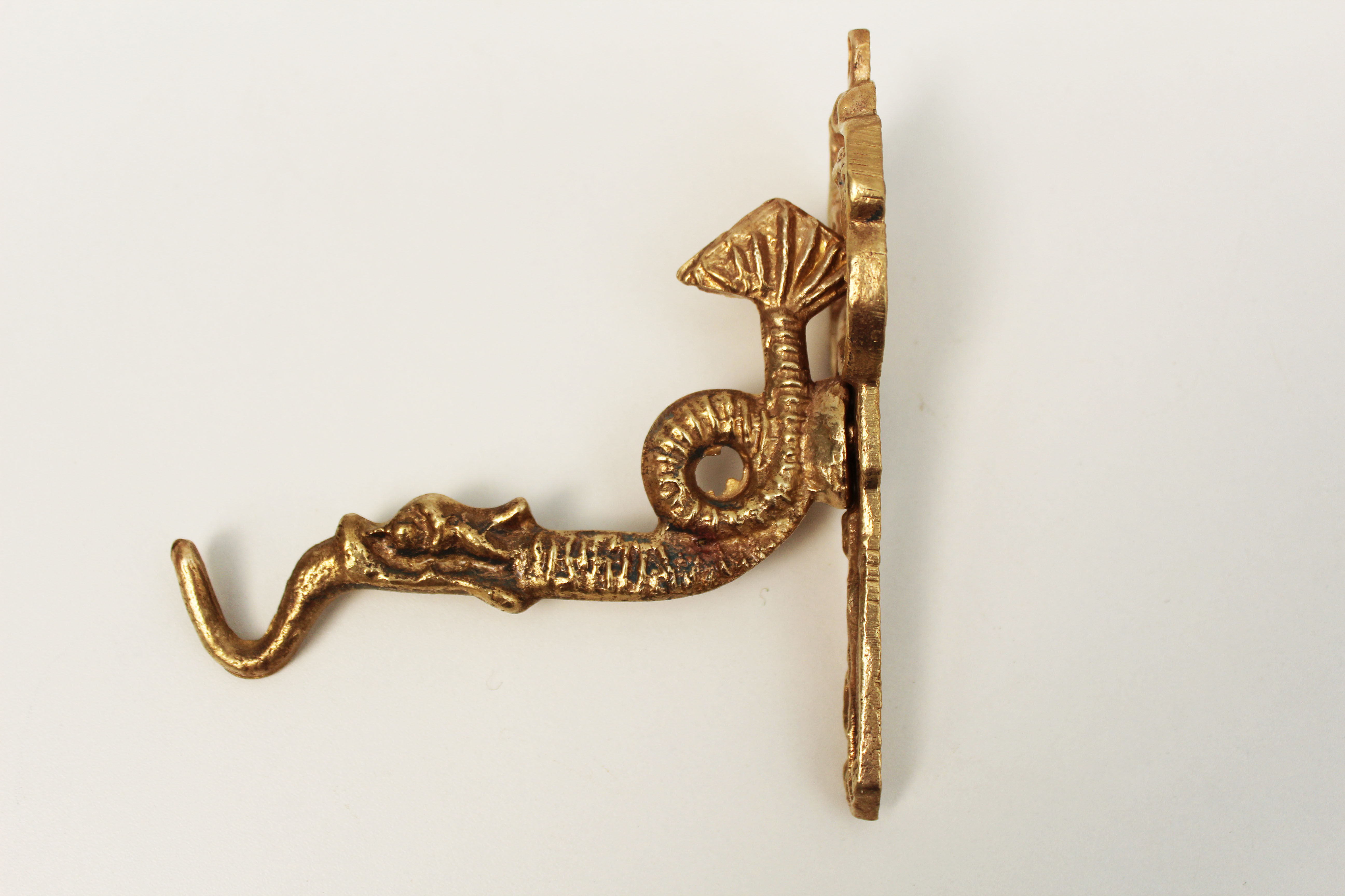 Coat hanger in rococo style, fish, dragon, dutch man and woman