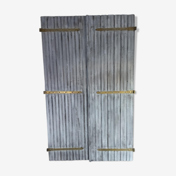 Pair of patinated shutters