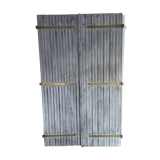 Pair of patinated shutters