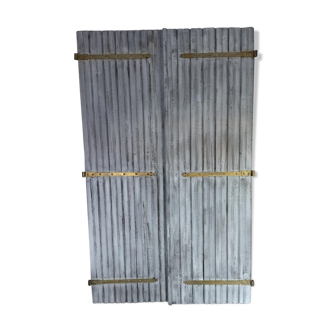 Pair of patinated shutters