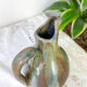 Art Nouveau style carafe in flamed stoneware with blue and brown drips