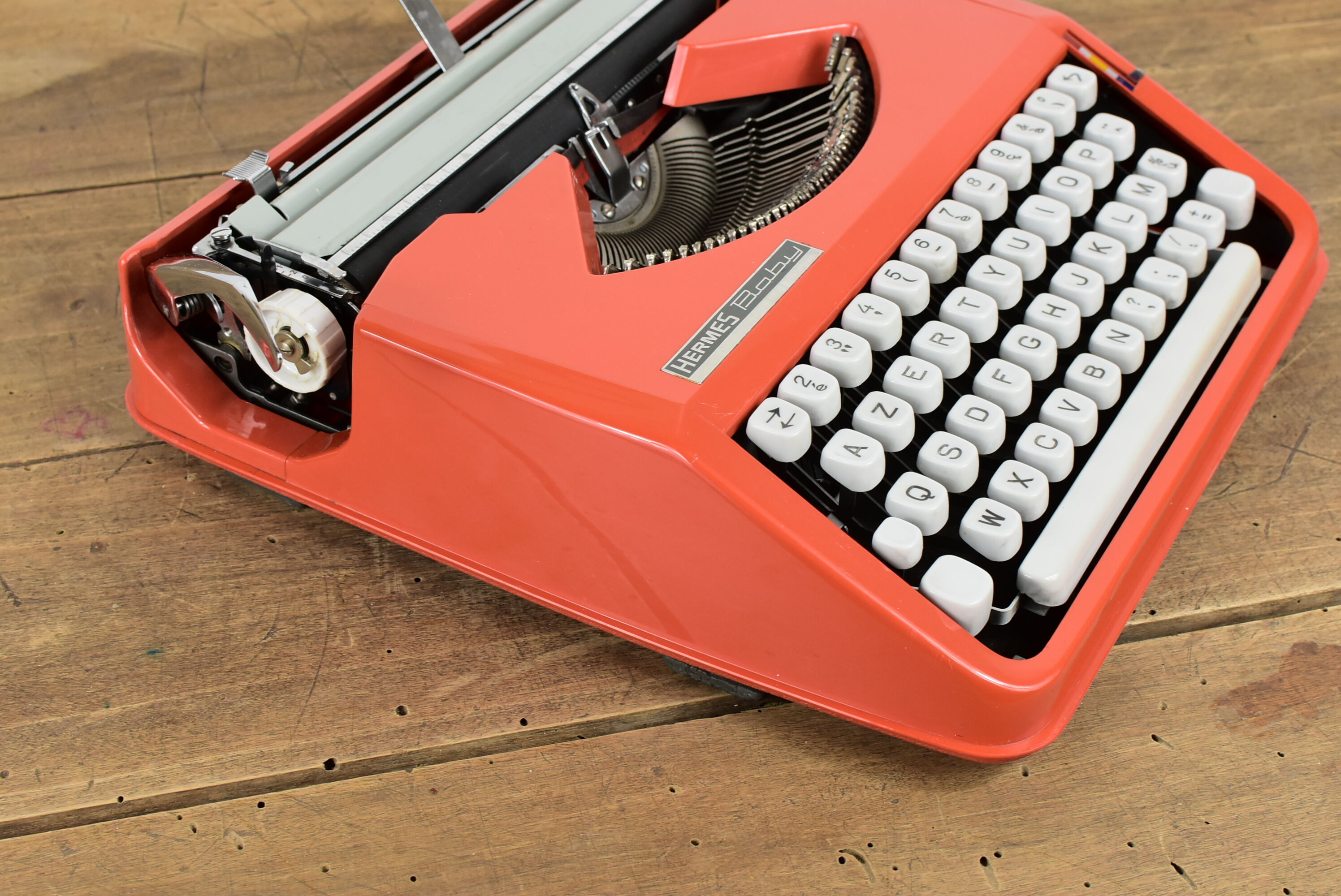 Hermès Baby orange typewriter.