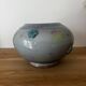 Magnificent pot or vase, handcrafted pottery with flowers, signed on the back.