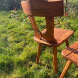 Three solid wood chairs