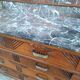 Art Deco commode with marble top, vintage antique furniture.