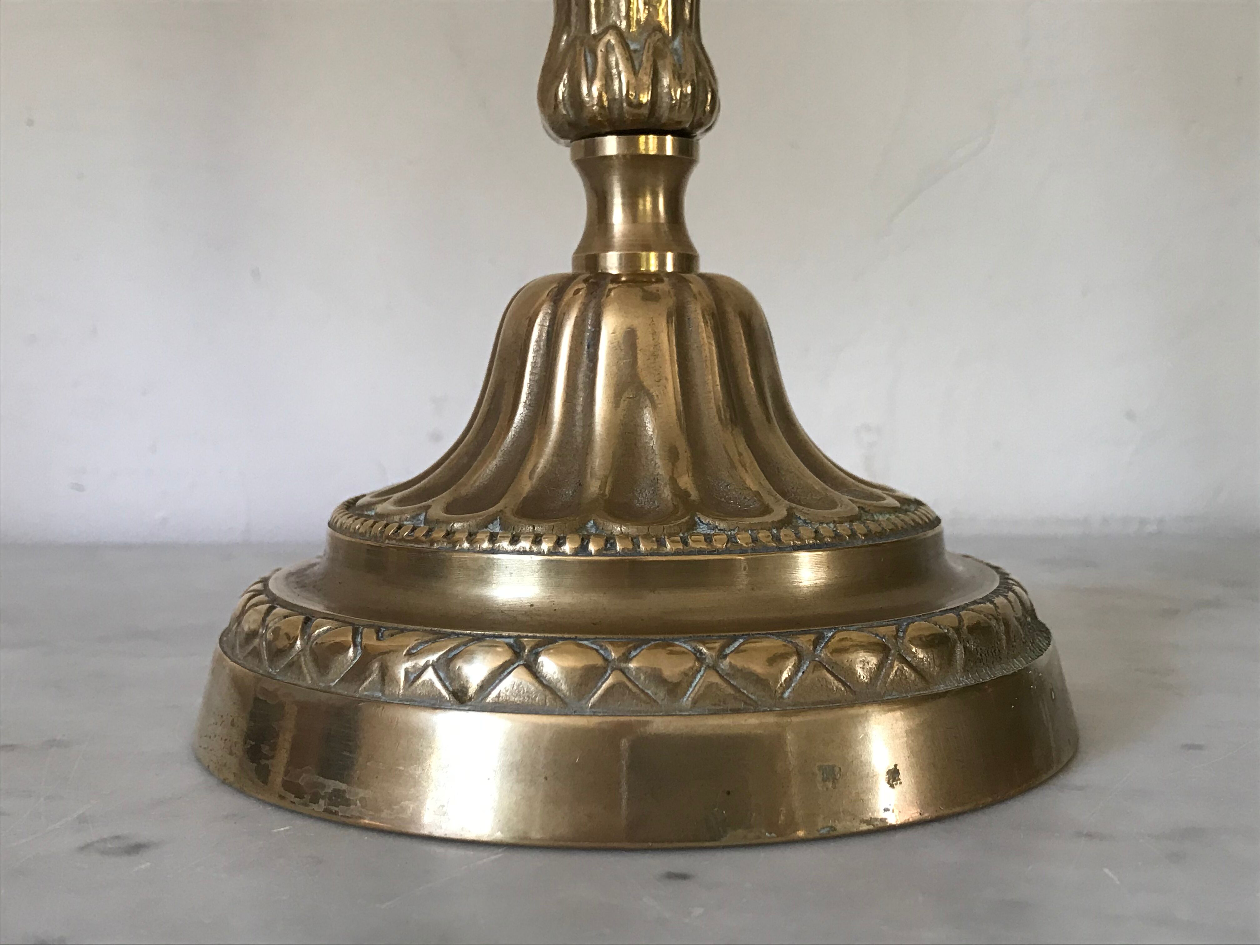 Pair of golden bronze candlesticks