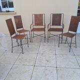 3 chaises et 2 fauteuils en fer forgé et rotin canné, années 50