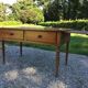 Old farmhouse table louis Philippe style in solid cherry with turned feet.