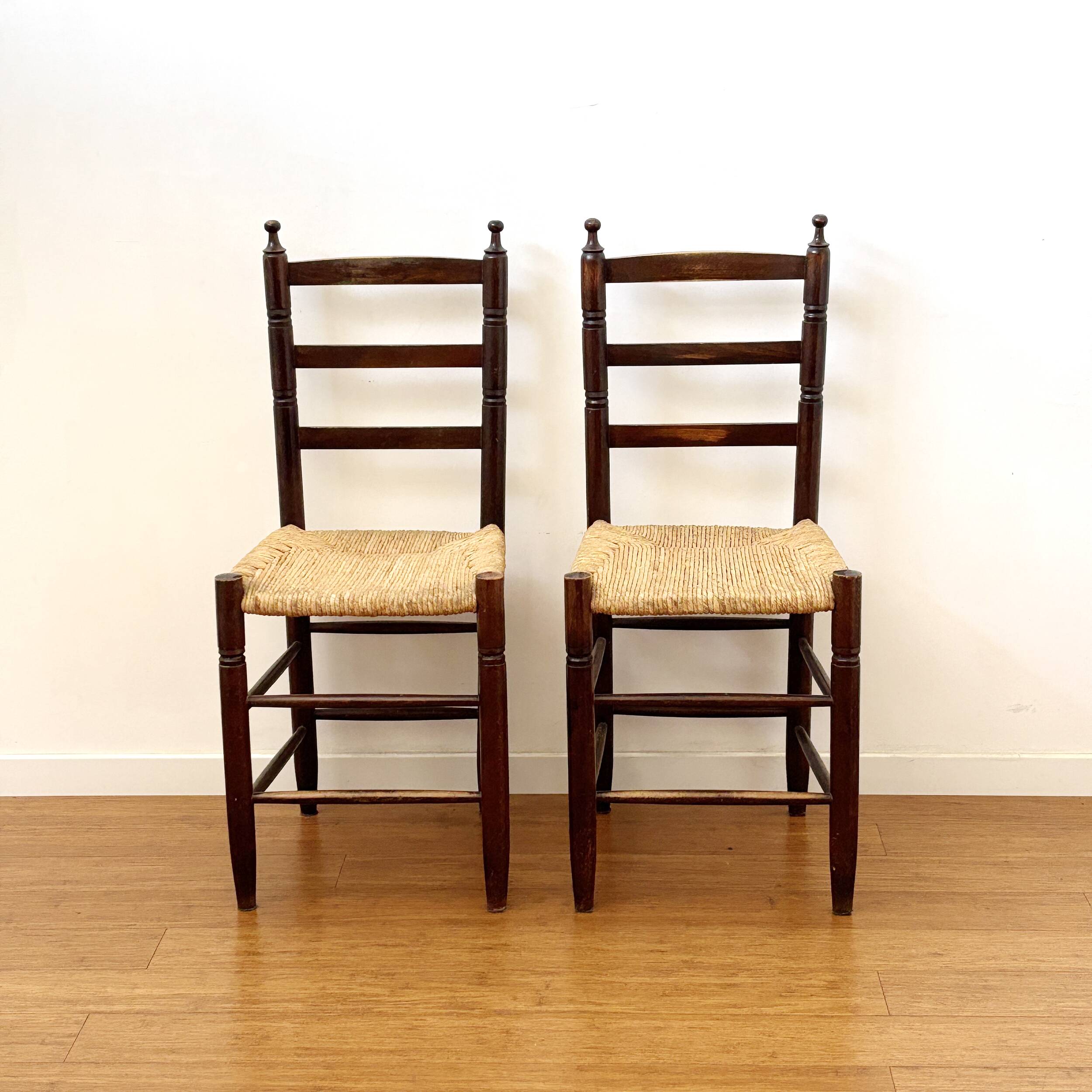 Pair of antique rush-seated chairs in solid wood – France, mid-20th century