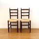 Pair of antique rush-seated chairs in solid wood – France, mid-20th century