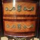 Veneered tambour door chest of drawers