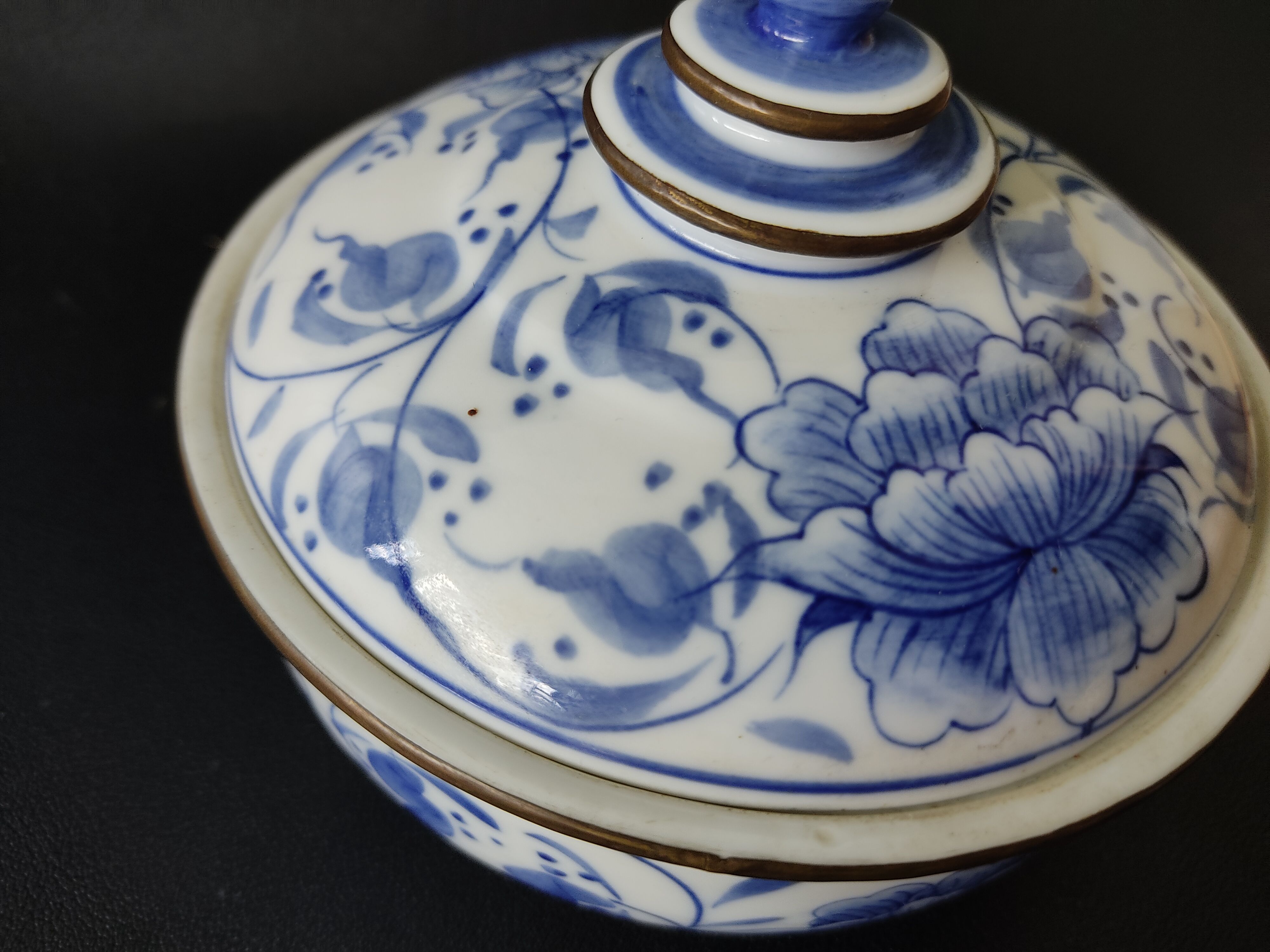 Hand-painted blue porcelain candy in Thailand