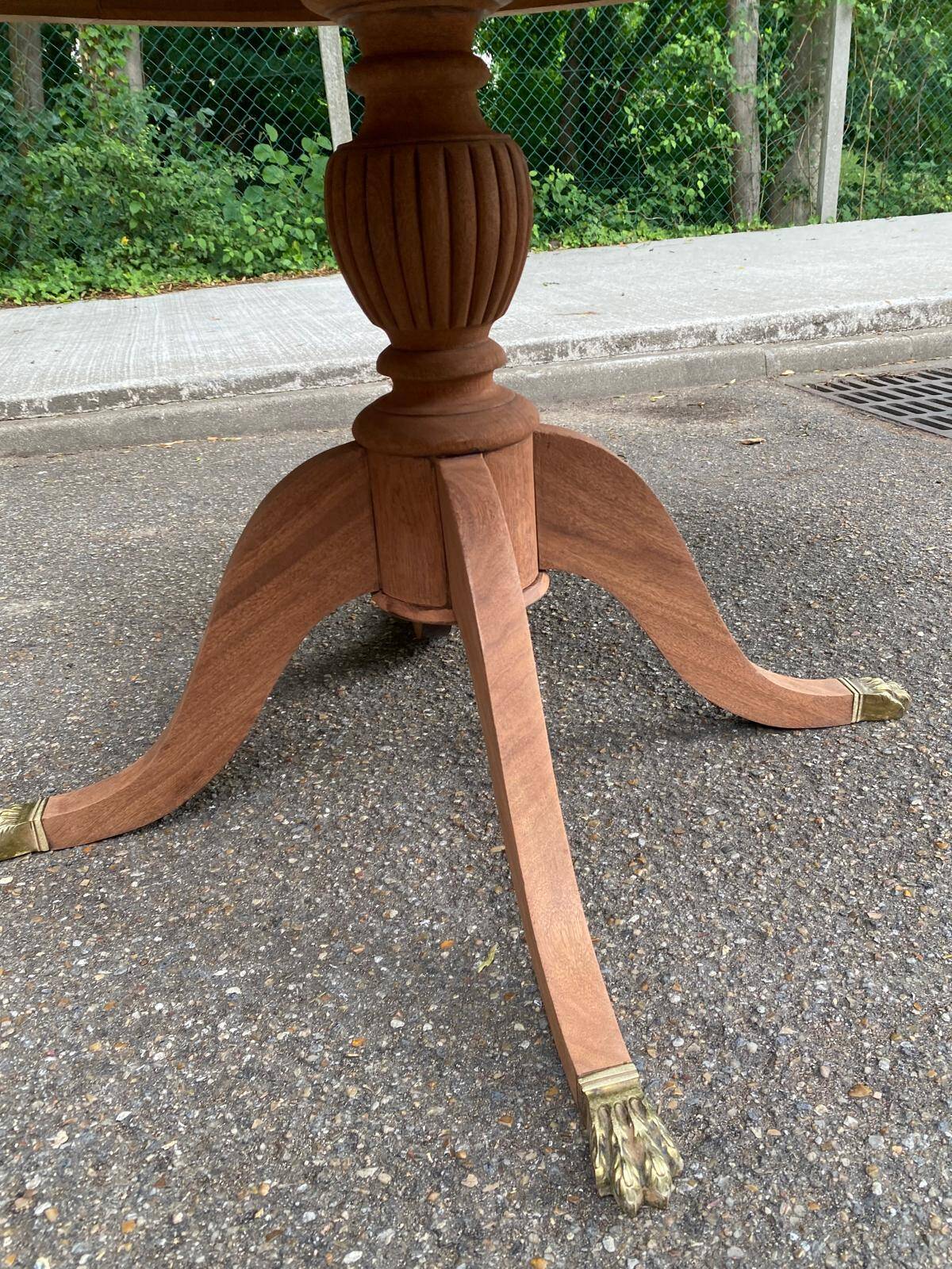 Round extendable dining table in solid mahogany from the 1930s.