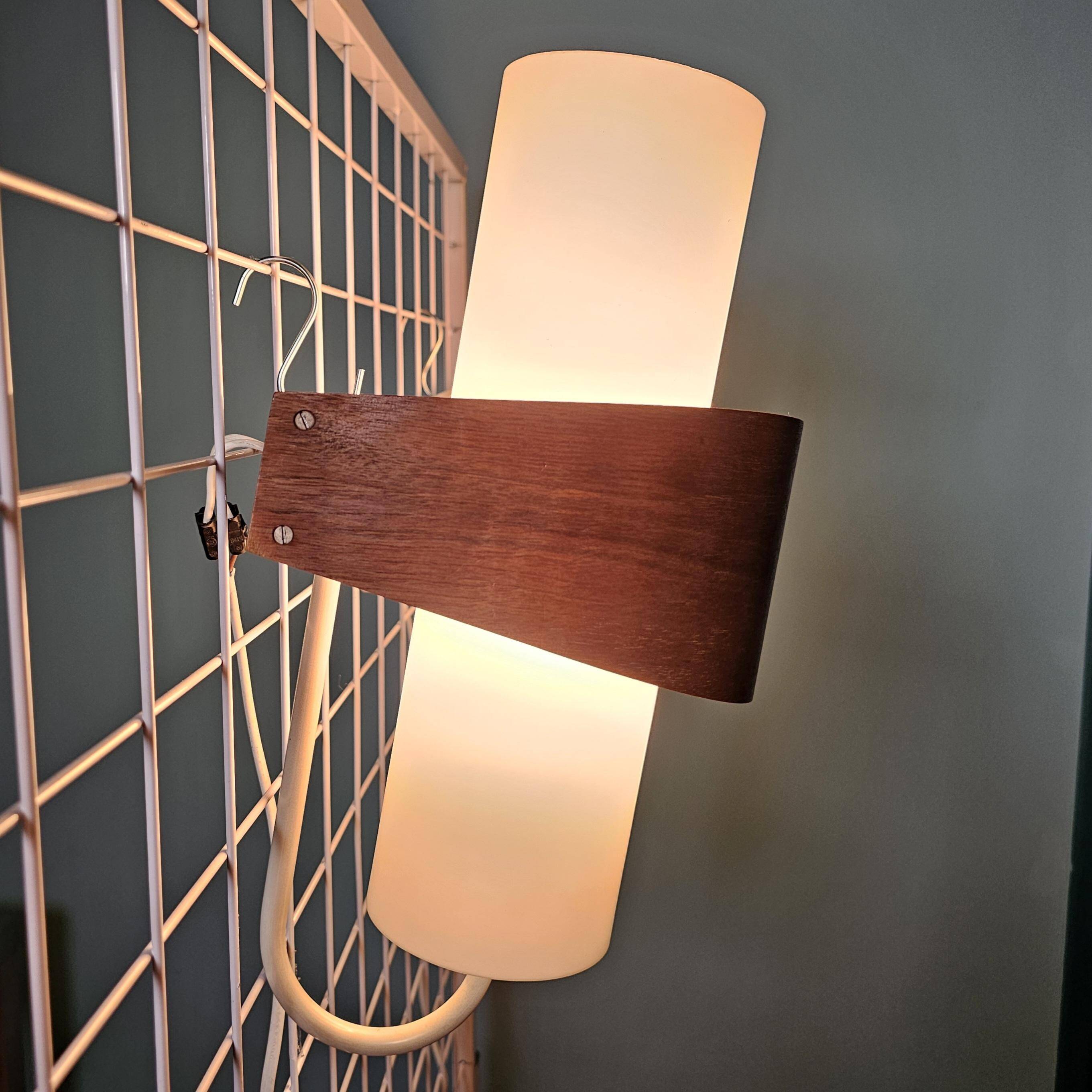 Louis kalff (1897-1976) for philips, pair of nx40 wall lights in wood, opaline glass, and lacquered metal,