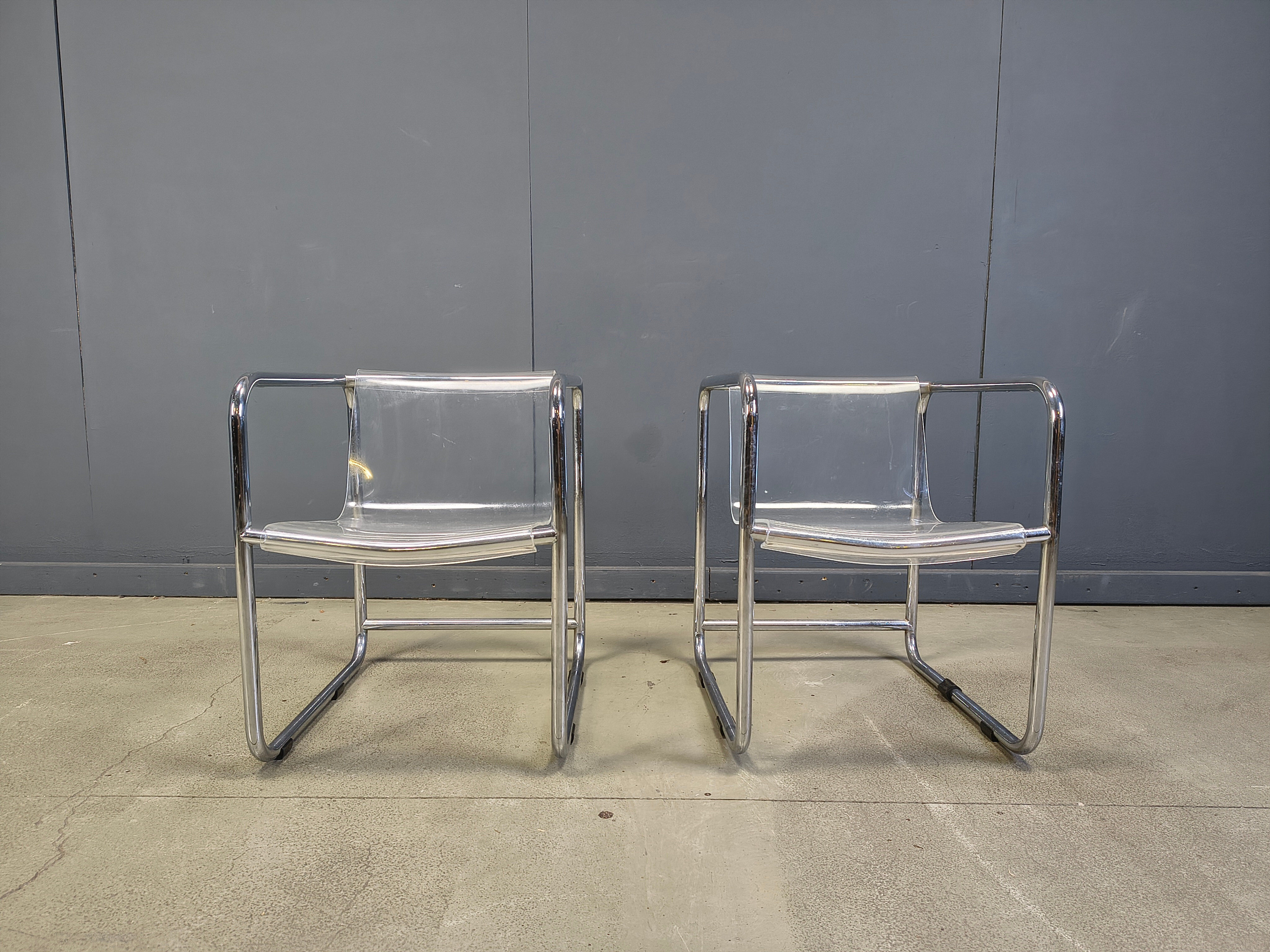 Pair of plexiglass and tubular chrome armchairs, 1970s