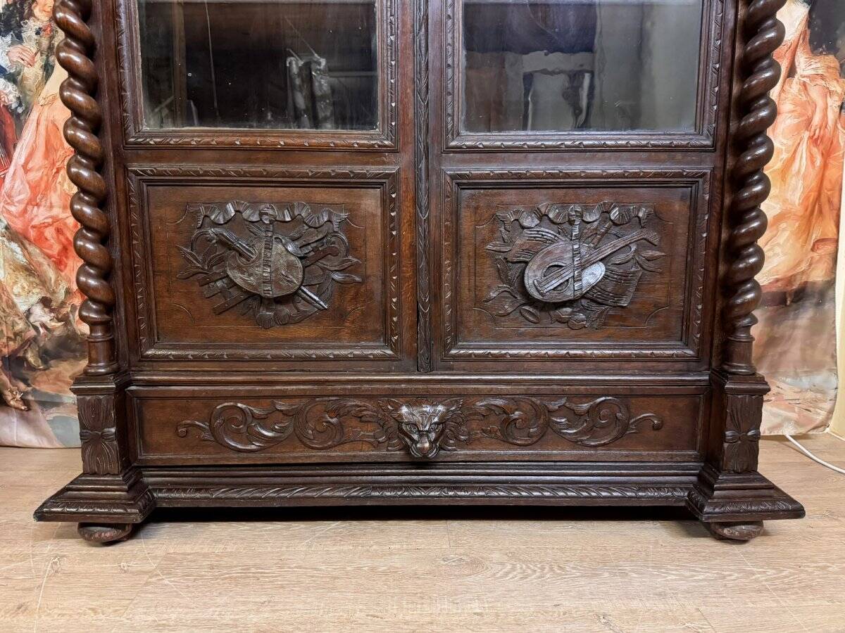 Renaissance style hunting lodge library in carved oak circa