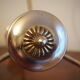 Suspension with 3 brass lights and a white glass globe from the 1950s-1960s.