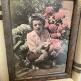 Old photograph of a woman with hydrangeas