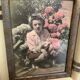 Old photograph of a woman with hydrangeas