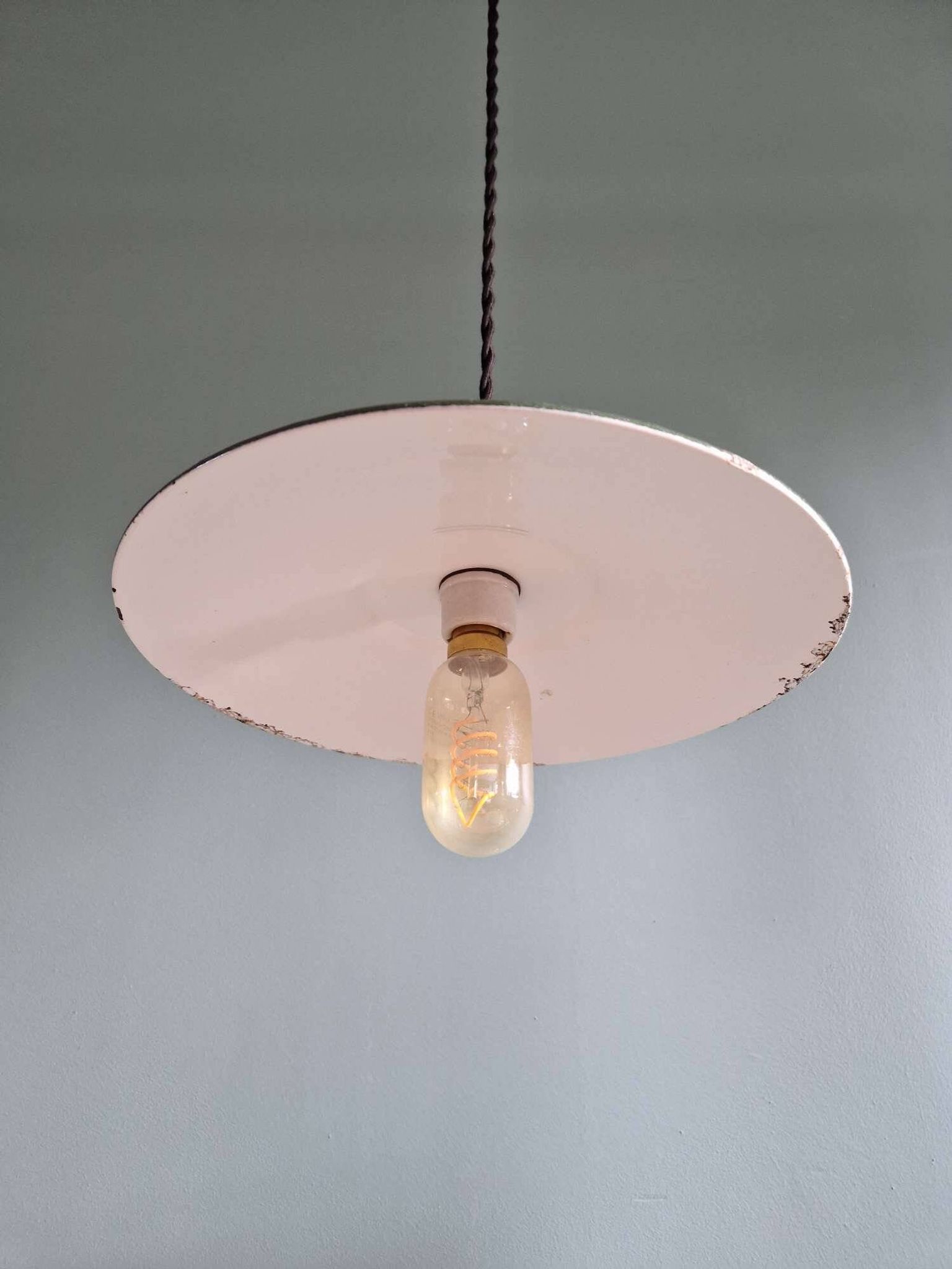 Trio of large industrial suspensions in green enamelled sheet metal.