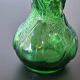 Vintage green glass vase with a fruit design in very good condition.