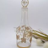 Old crystal carafe with golden decoration
