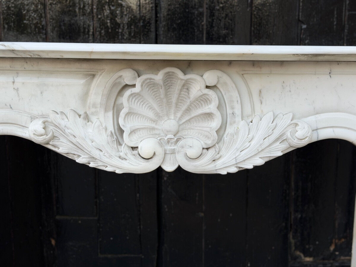 Louis XV style fireplace in Carrara marble, circa 1980.