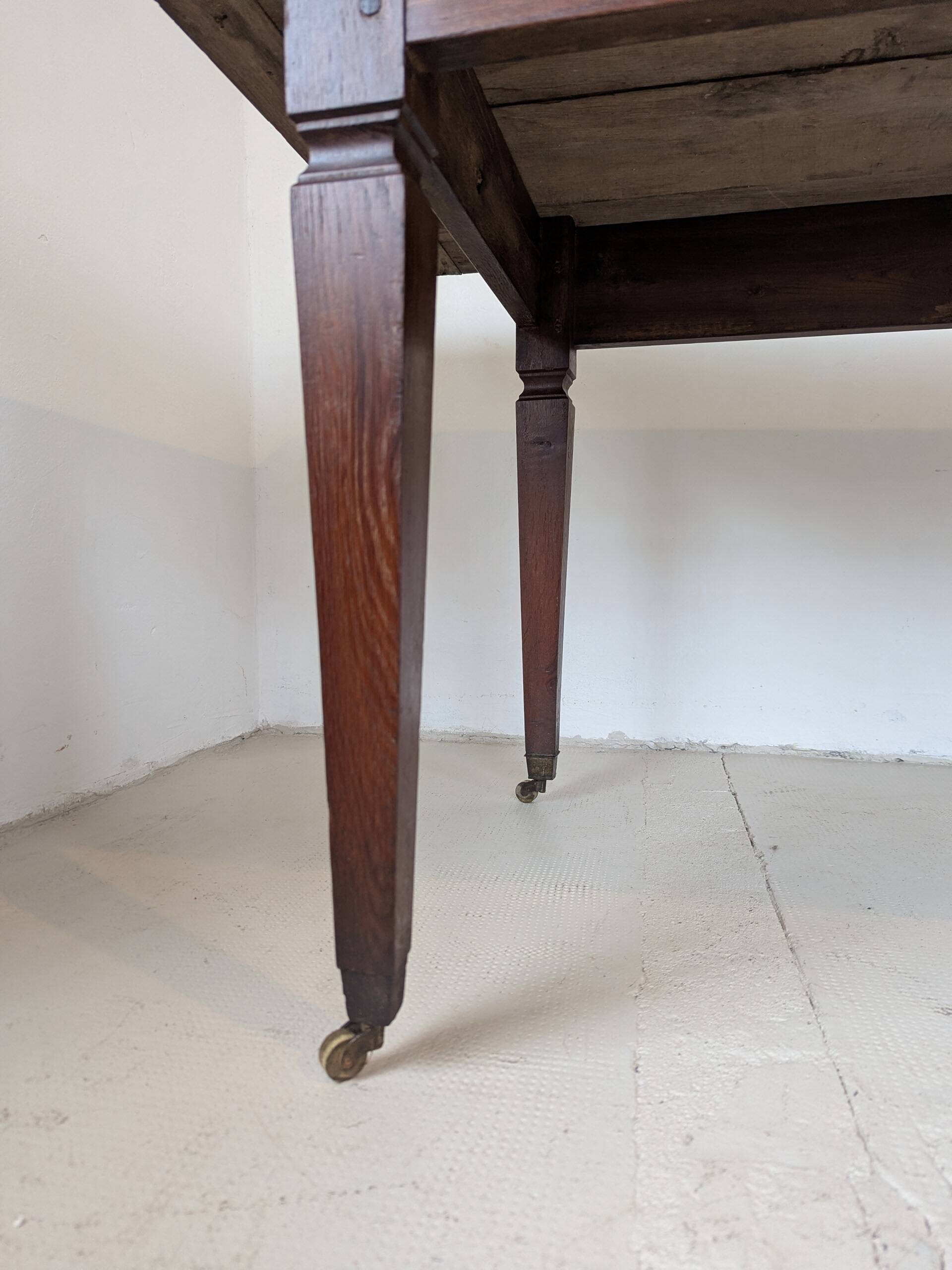 Campaign table in solid oak, Directoire style.