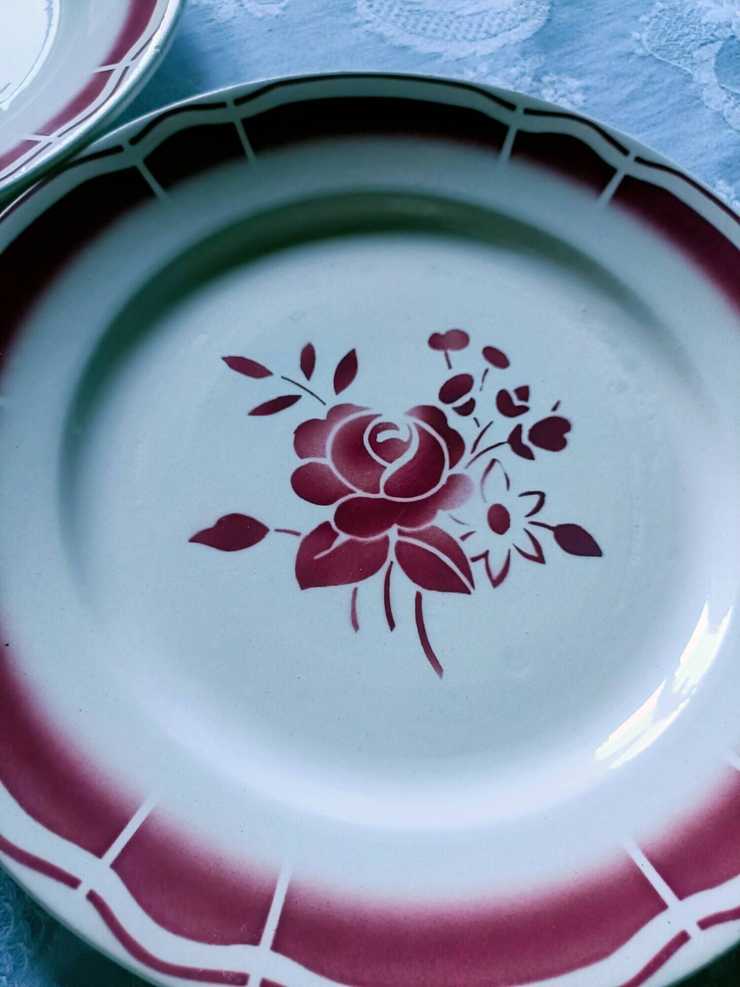 Five numbered opaque porcelain plates from Badonviller.
