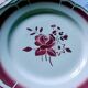Five numbered opaque porcelain plates from Badonviller.