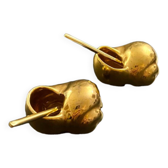 2 Snail-shaped salt pots in gold-colored porcelain