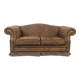 Pair of two-seater sofas with wide armrests
