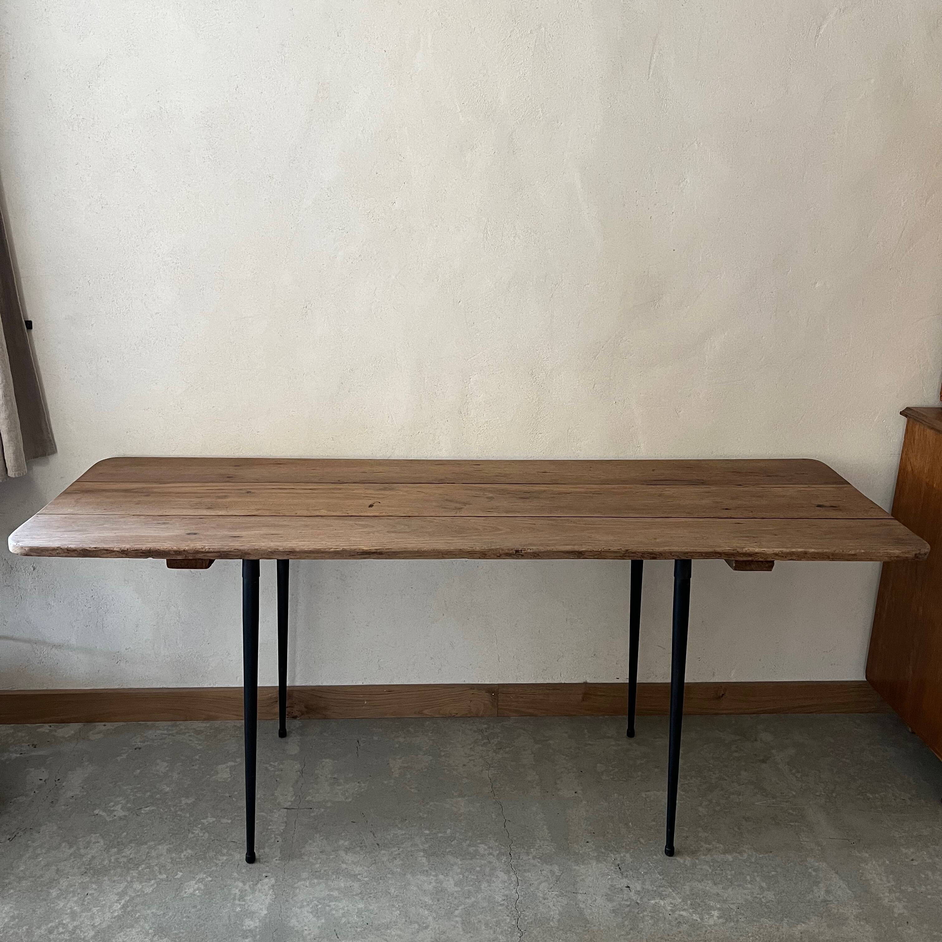 Wooden table, black metal legs