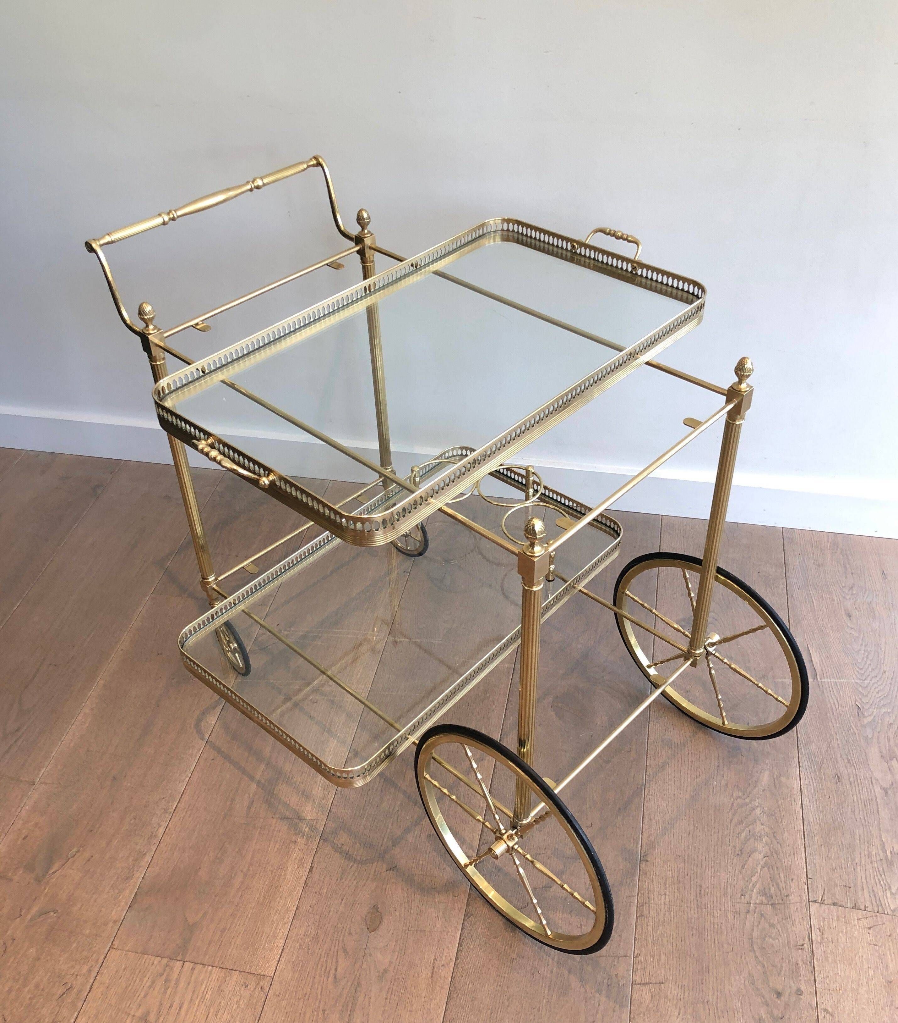 Brass rolling table with removable double trays from Maison Jansen.