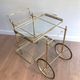 Brass rolling table with removable double trays from Maison Jansen.