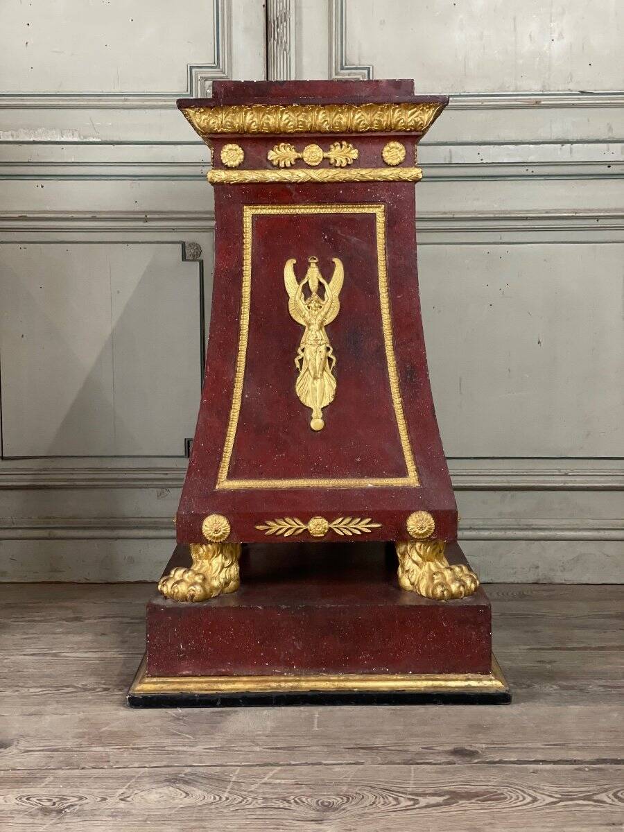 Pair of plaster bases imitating porphyry and gilded bronze circa 1980.