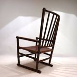Manou rattan armchair with leather seat, 1960