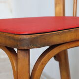 Bistro chair with bars of the 50s in wood and imitation red leather