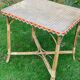 High wicker and rattan table