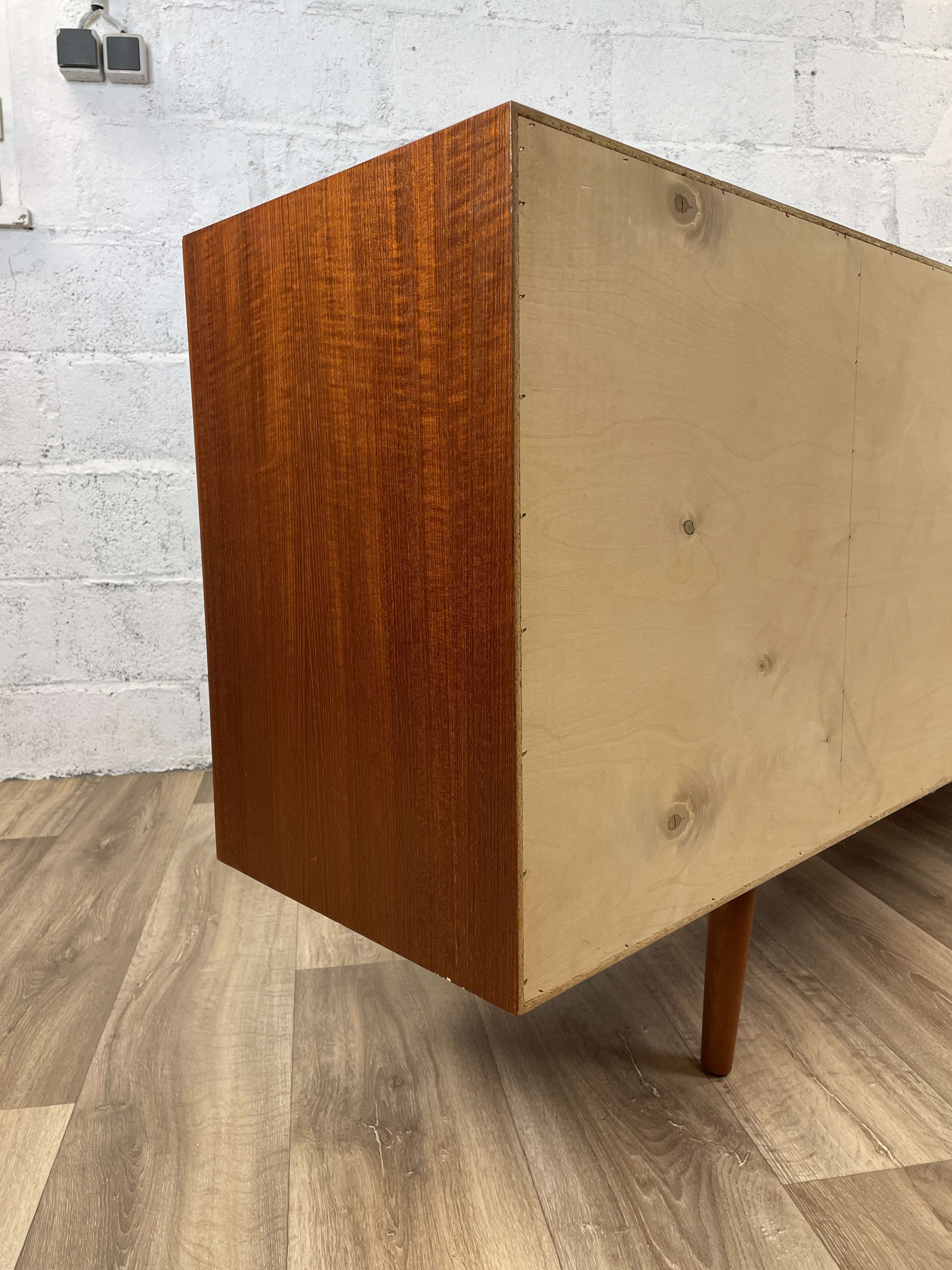 Scandinavian teak sideboard with 4 sliding doors, 60s