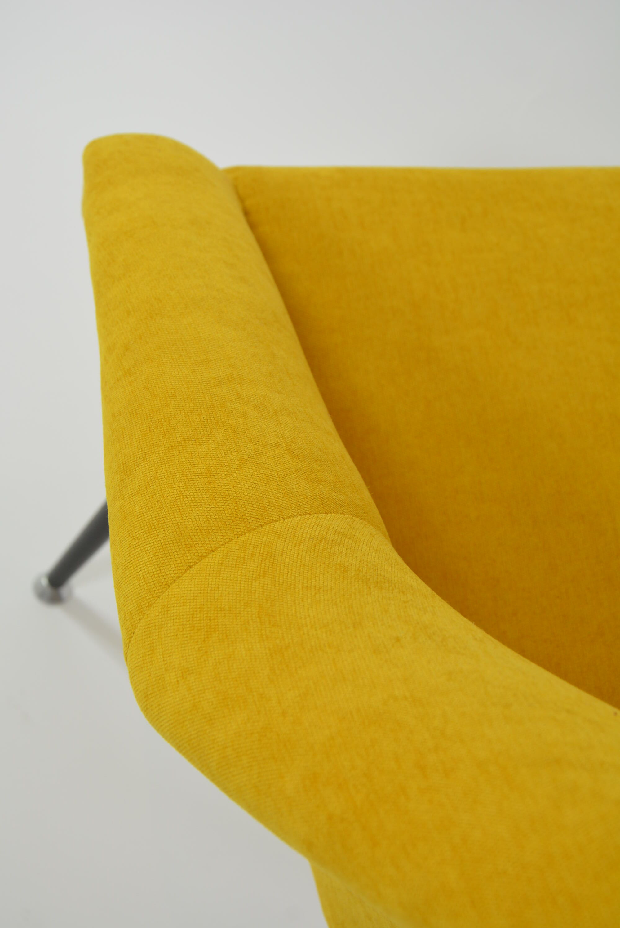 Yellow shell armchair