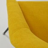 Yellow shell armchair