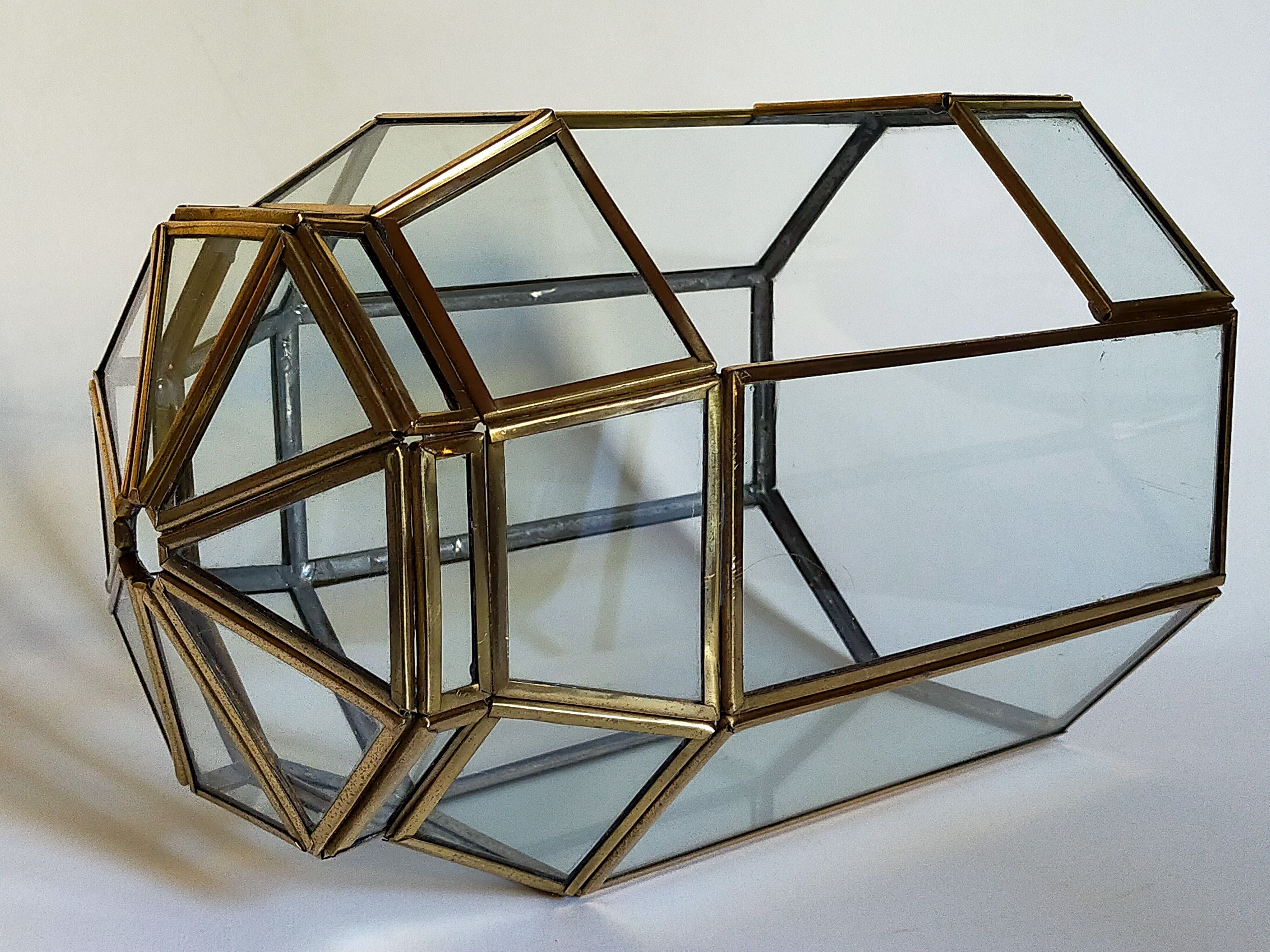 Indoor greenhouse-terrarium in brass