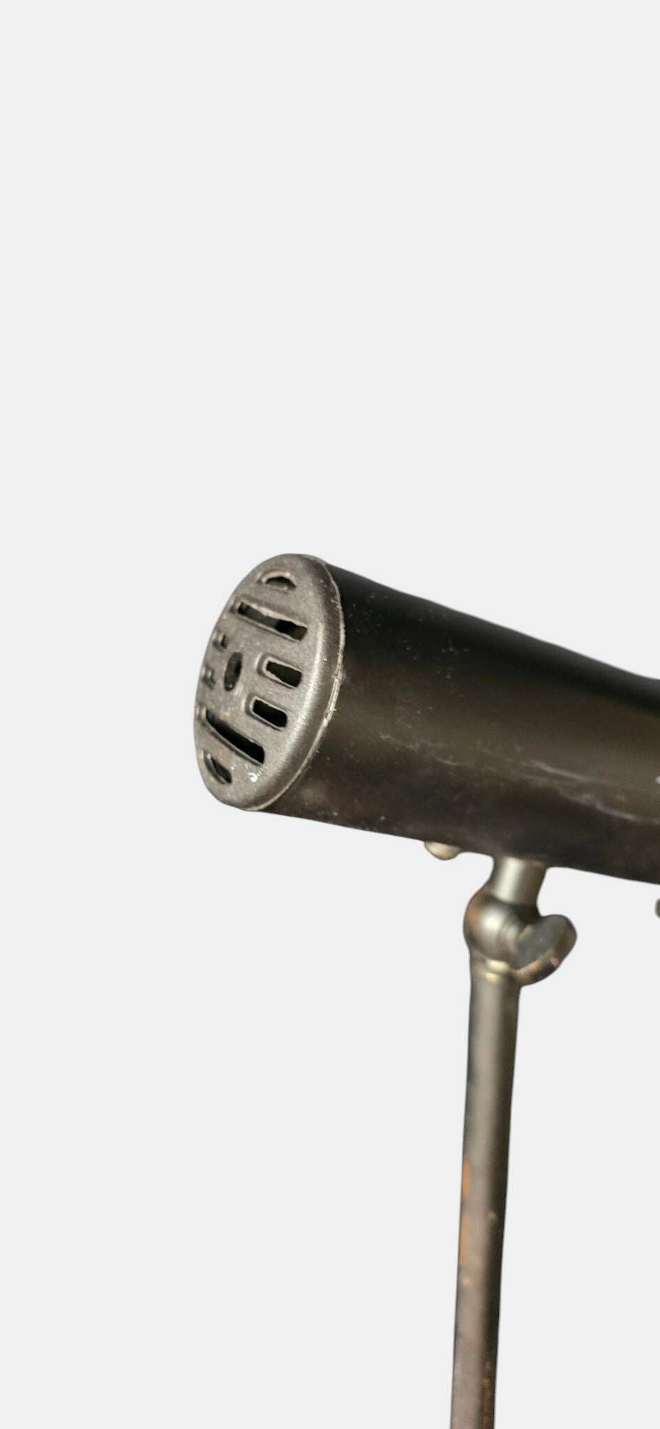 Minimalist metal wall light in the style of Jean Prouvé, circa 1950.
