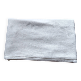 Old white damask cotton tablecloth