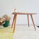 Antique coffee table with compass legs