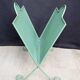 Vintage magazine rack in painted sheet metal