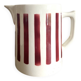 Antique earthenware pitcher with burgundy stripes